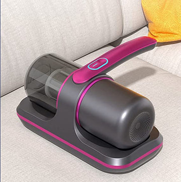 ForKumi allergen vacuum cleaner for dust mites in black and pink on light gray couch