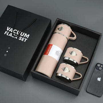 ForKumi 12 hour stainless steel thermos set with one tall flask and two matching cups in beige color