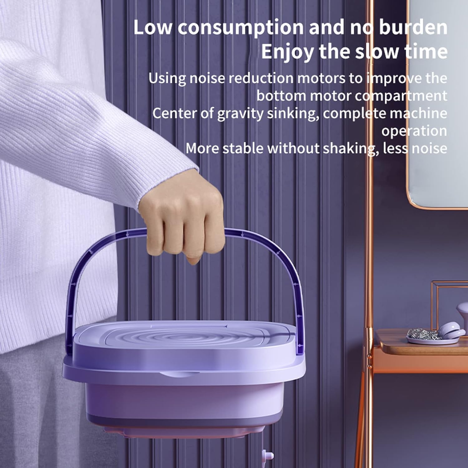ForKumi 9L compact laundry machine in purple being carried by hand for easy portability