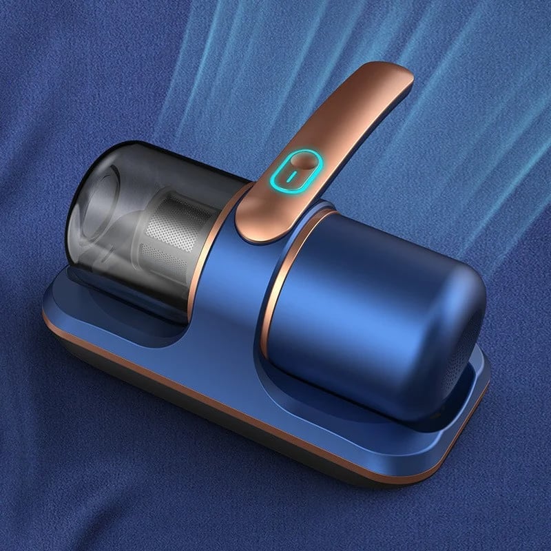ForKumi allergen vacuum cleaner for dust mites in blue and copper on fabric surface