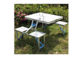ForKumi folding patio table set with white tabletop and attached benches on green grass