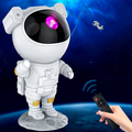 ForKumi astronaut galaxy projector night light with remote control displaying space-themed lighting