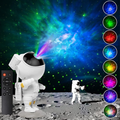 ForKumi astronaut galaxy projector night light displaying colorful space nebula with remote control