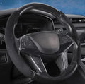 ForKumi black anti-slip steering wheel cover fitted on a car steering wheel for better grip