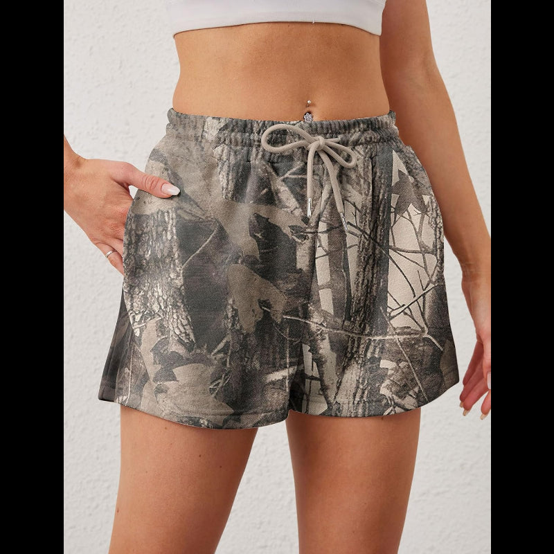 Avis camo elastic waist shorts with drawstring and side pockets worn with white crop top