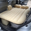 ForKumi beige car air mattress with pump inflated on backseat with pillows for comfortable travel