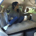 ForKumi car air mattress with pump inflated on backseat for comfortable travel rest