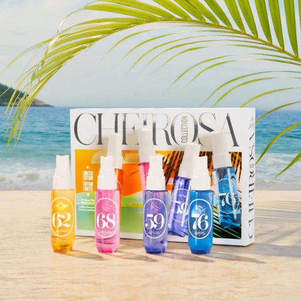ForKumi warm gourmand perfume mist set with colorful bottles displayed on beach background