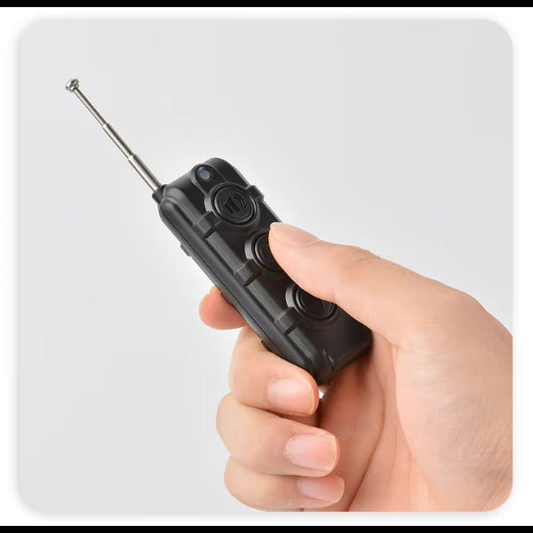 ForKumi remote control for smart dog training collar held in hand with extendable antenna