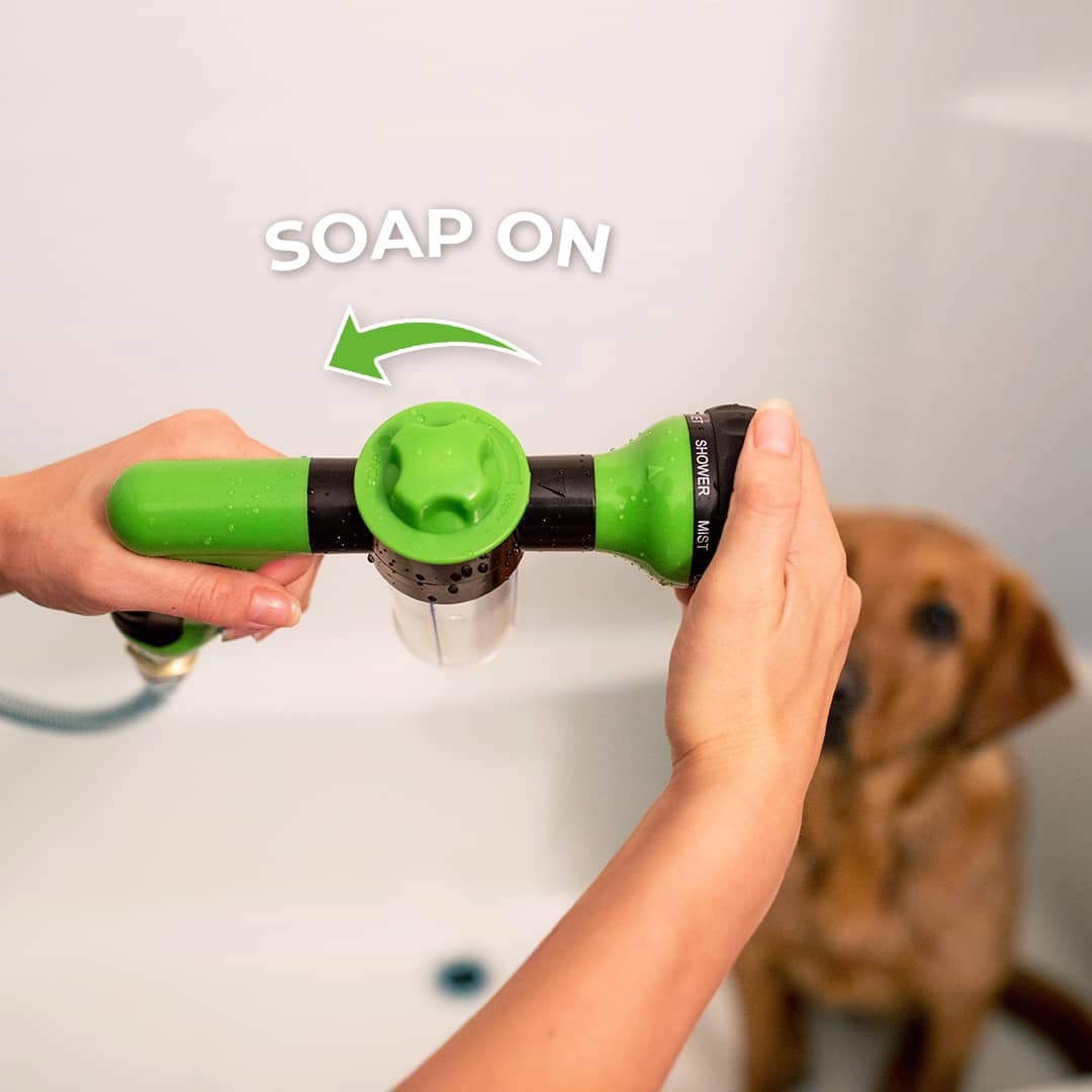 ForKumi dog bathing sprayer with multiple modes held in hands with soap function demonstrated