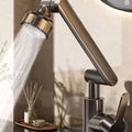 ForKumi dual temperature kitchen faucet with bronze finish and adjustable spray head running water