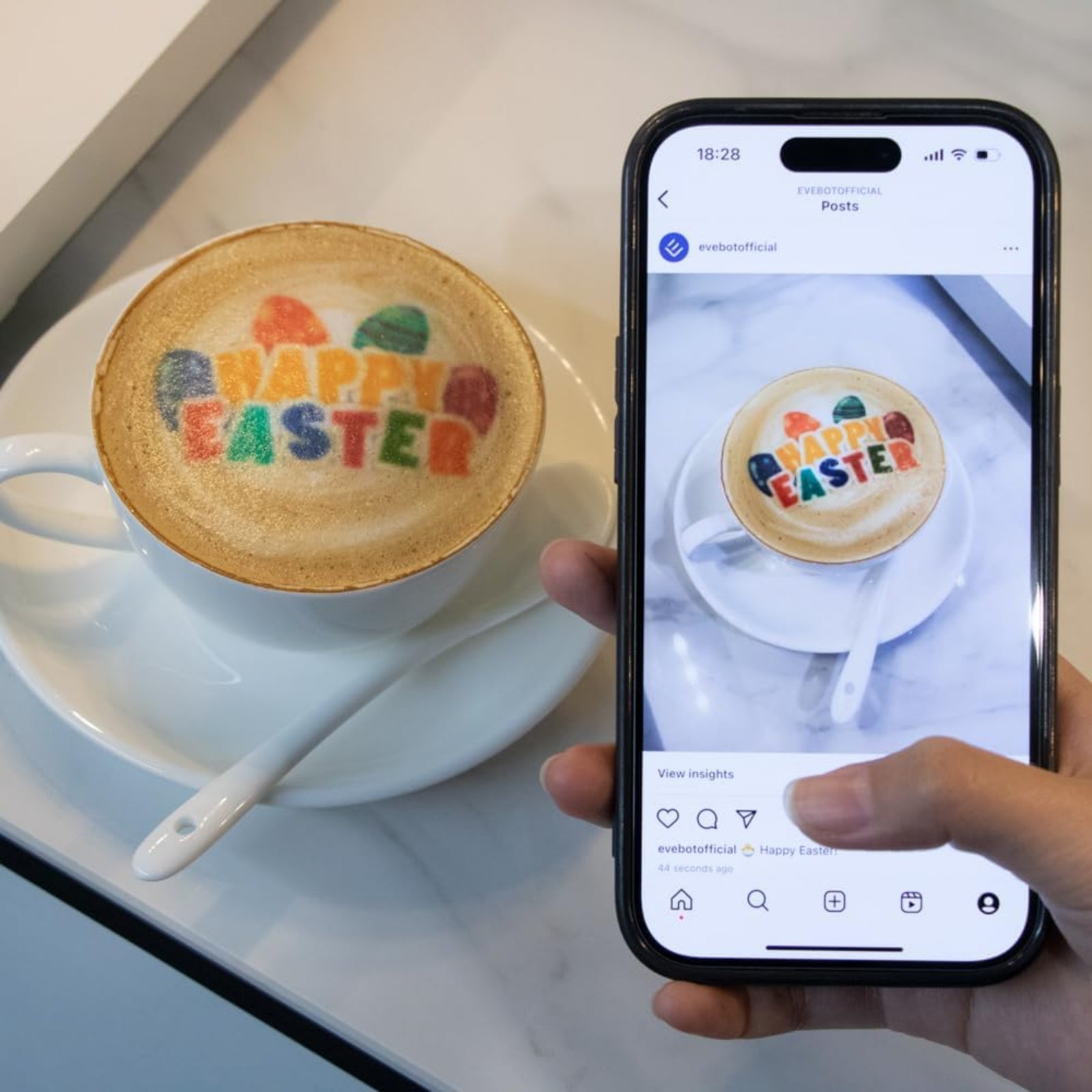 Custom coffee art printer producing colorful Happy Easter design on latte foam shown on phone and cup