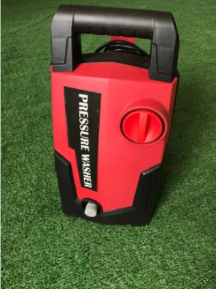 ForKumi 1400W electric pressure washer in red and black with handle and control knob on green surface