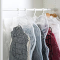 ForKumi vacuum storage bags for clothes hanging in a closet to save space and protect garments
