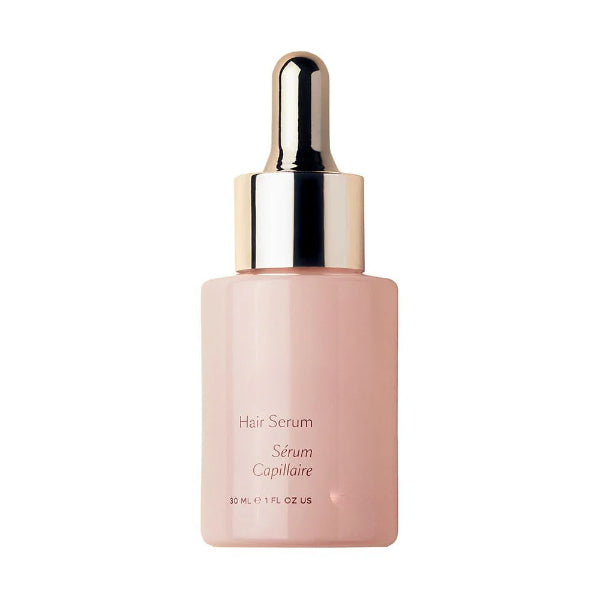 ForKumi hair serum for shiny hair in a pink 30ml bottle with gold dropper cap