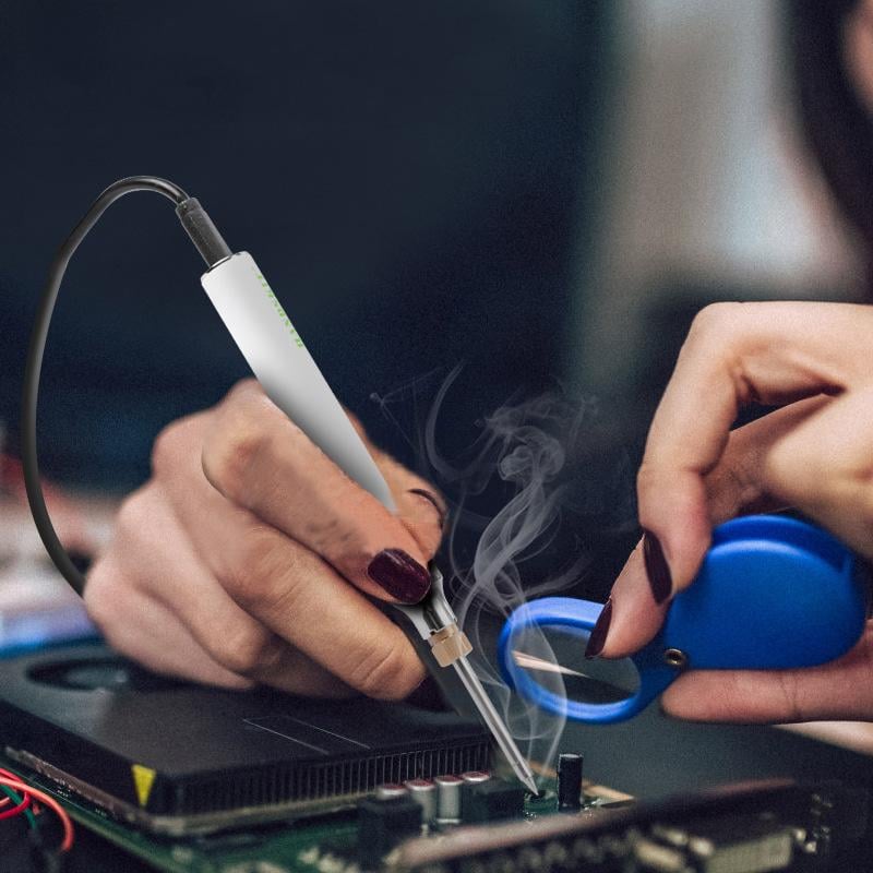 ForKumi USB portable soldering iron used for detailed electronic circuit board repair