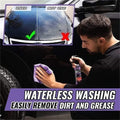 Man using Avis nano car scratch repair spray for waterless washing to remove dirt and grease from black car surface