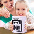 Child holding a ForKumi kids ATM piggy bank with panda design while parent inserts a coin