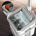 ForKumi large flat mop set with bucket showing mop head being rinsed and water flow details
