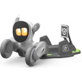 Loona AI robot pet in white and gray with glowing eyes and charging station for interactive play