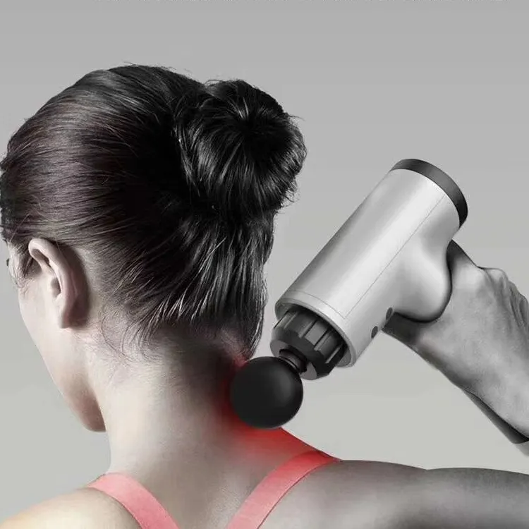 ForKumi mini percussion massage gun being used on the neck to relieve muscle tension