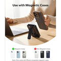MagSafe power bank being used with a magnetic case attached to an iPhone near a laptop on a wooden desk