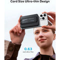 MagSafe power bank attached to the back of a smartphone showing its ultra-thin card size design