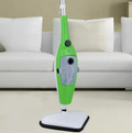 ForKumi green multi purpose steam cleaner for home with white base on living room floor