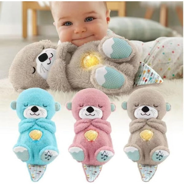 Avis musical otter soother for babies in blue pink and gray plush designs with baby holding a gray one