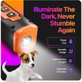 Avis ultrasonic dog trainer with built-in light illuminating dark area and a small dog nearby