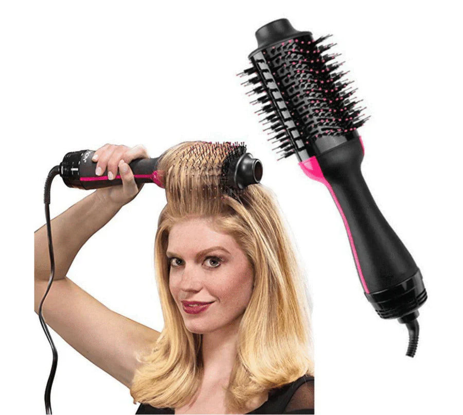 ForKumi 1000W hot air brush styler used by woman to style blonde hair with volumizing brush