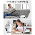 Portable thermal printer being used at home for printing receipts and documents in casual settings