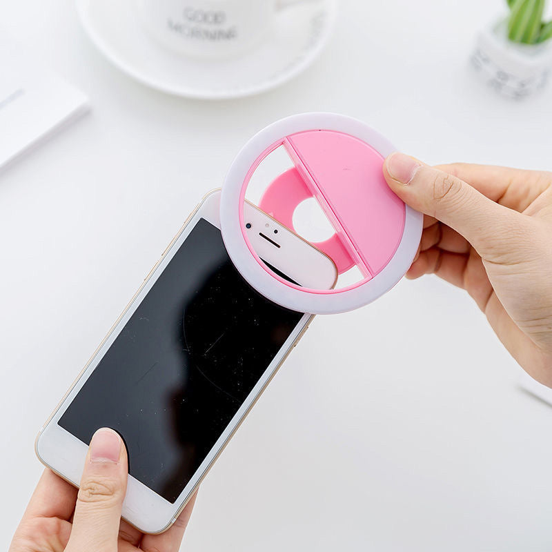 ForKumi pro selfie ring light clip-on with pink and white design attached to smartphone for better lighting