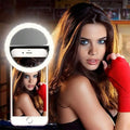 ForKumi pro selfie ring light attached to smartphone illuminating woman's face for perfect photos