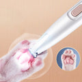 ForKumi professional pet grooming clippers trimming soft fur around a cat's pink paw pads