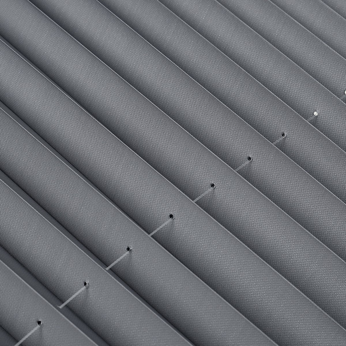 Close-up of grey fabric material used in ForKumi retractable car sunshade for UV protection