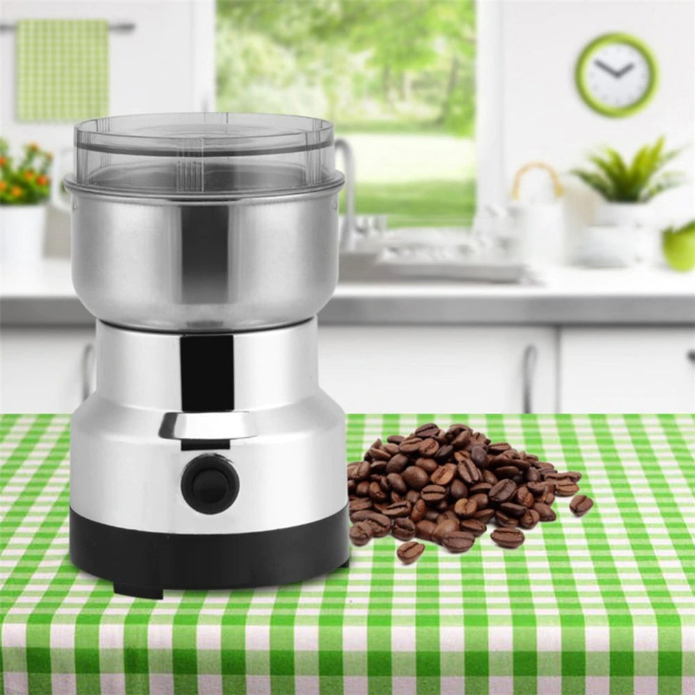 ForKumi small electric grinder for home with stainless steel body and coffee beans on green checkered tablecloth