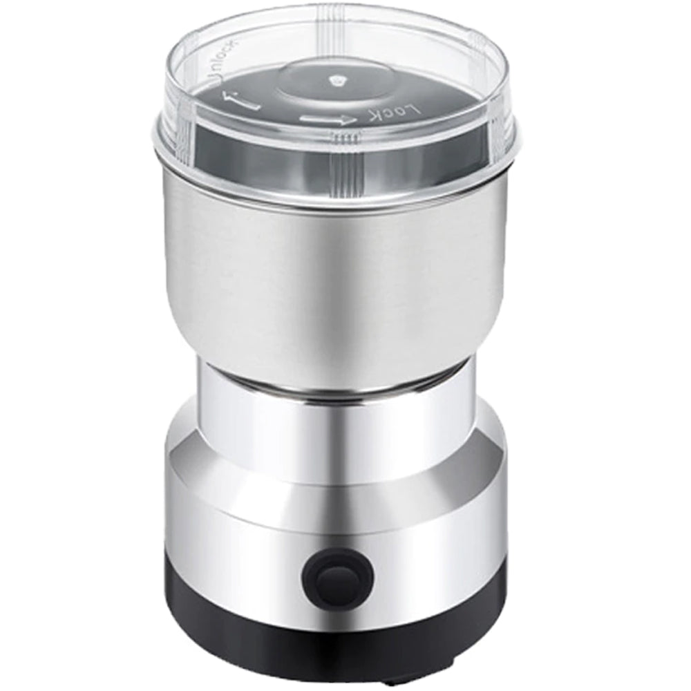 ForKumi small electric grinder for home made of stainless steel next to a steaming cup of coffee on wooden table