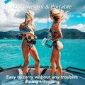 Two women on boat holding lightweight and portable underwater scooter for adults with ocean background
