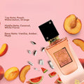 ForKumi tropical vanilla musk perfume bottle surrounded by peach, watermelon, and coconut slices on pink background