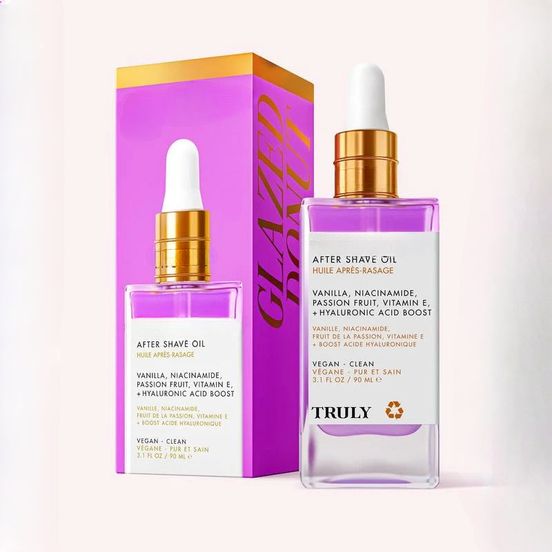 Avis men's post-shave serum in clear bottle with gold dropper and purple box packaging