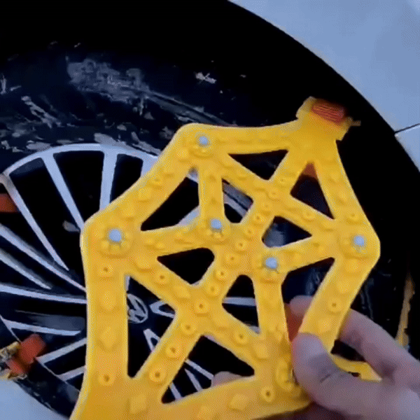 ForKumi universal snow chains for tires with yellow plastic design for secure winter traction