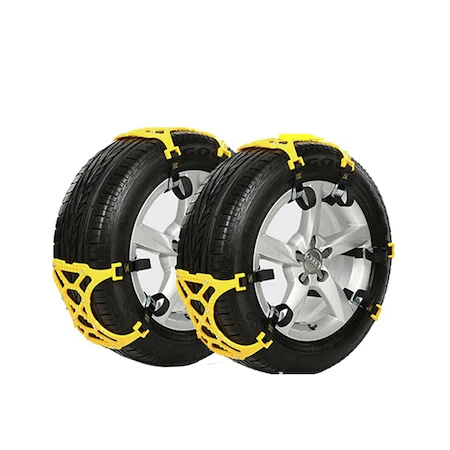 ForKumi universal snow chains for tires in yellow fitted on two car tires for winter traction