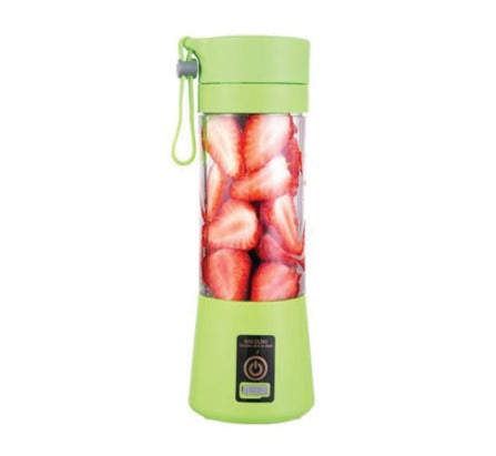 ForKumi USB portable blender in green filled with fresh strawberries for smoothies