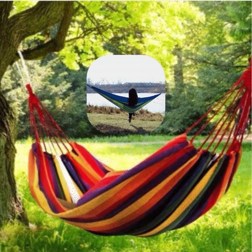 ForKumi colorful striped single person outdoor hammock hanging between trees in a sunny garden