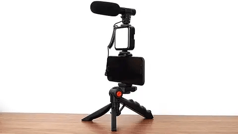 ForKumi vlog creator kit with microphone mounted on a tripod stand with smartphone holder