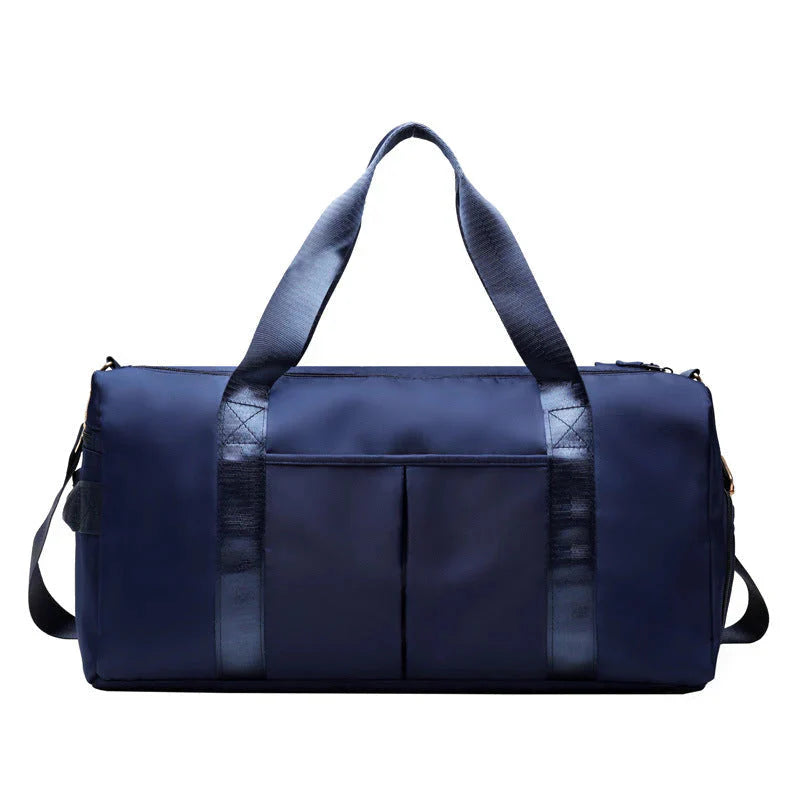 ForKumi waterproof gym duffel bag in navy blue with dual handles and front pockets