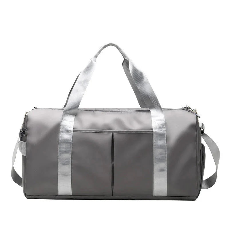 ForKumi waterproof gym duffel bag in gray with silver straps and multiple compartments