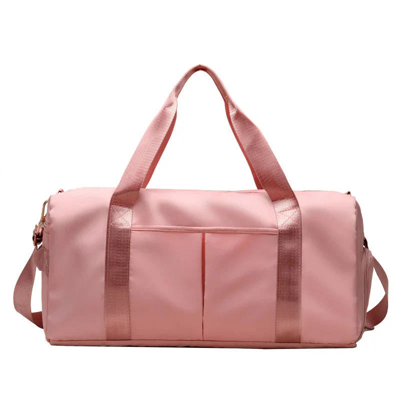 ForKumi pink waterproof gym duffel bag with dual handles and adjustable shoulder strap