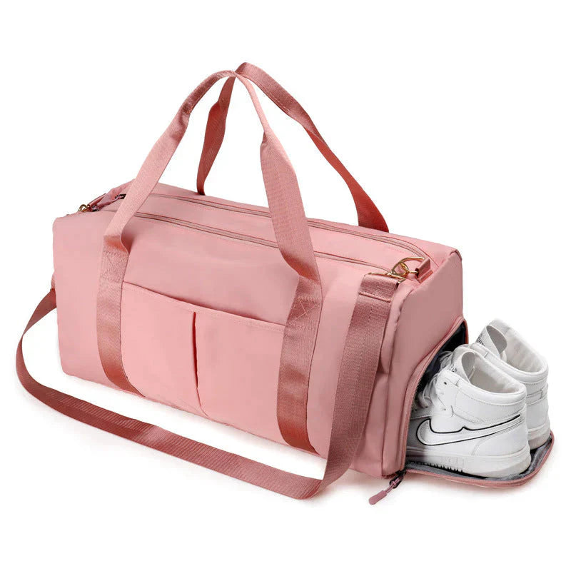 ForKumi pink waterproof gym duffel bag with side shoe compartment and multiple handles